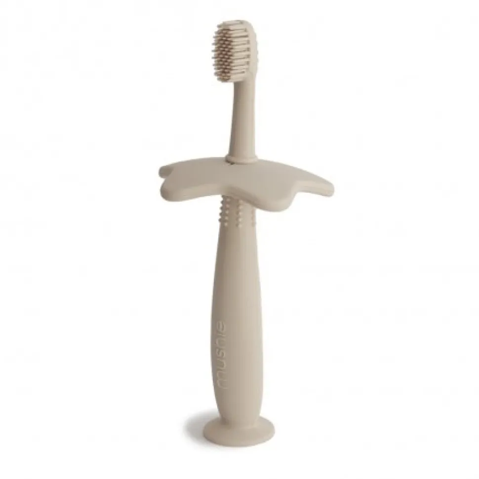 Cepillo de dientes aprendizaje mushie shifting sand