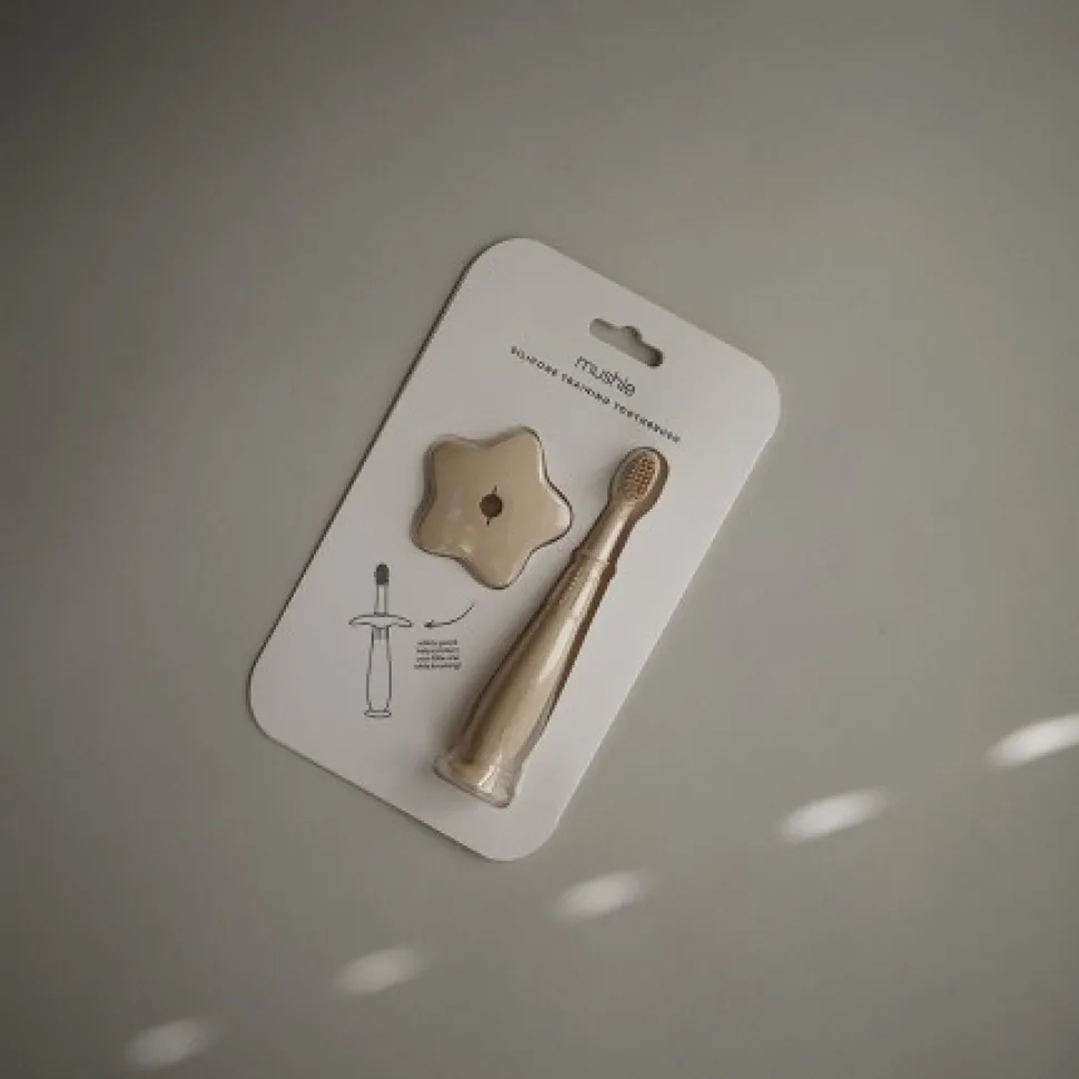 Cepillo de dientes aprendizaje mushie shifting sand